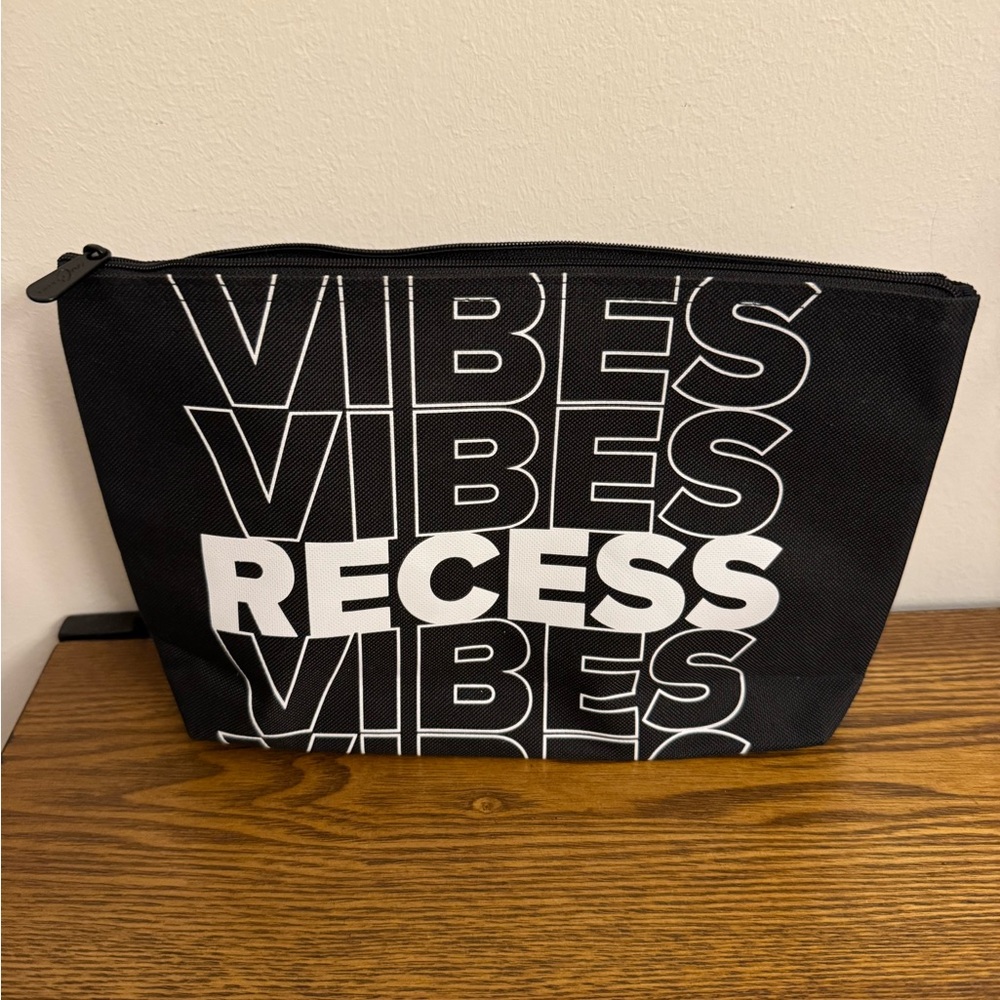 Thirty-One Medium Zipper Pouch in the "Recess Vibes" pattern. NWOT